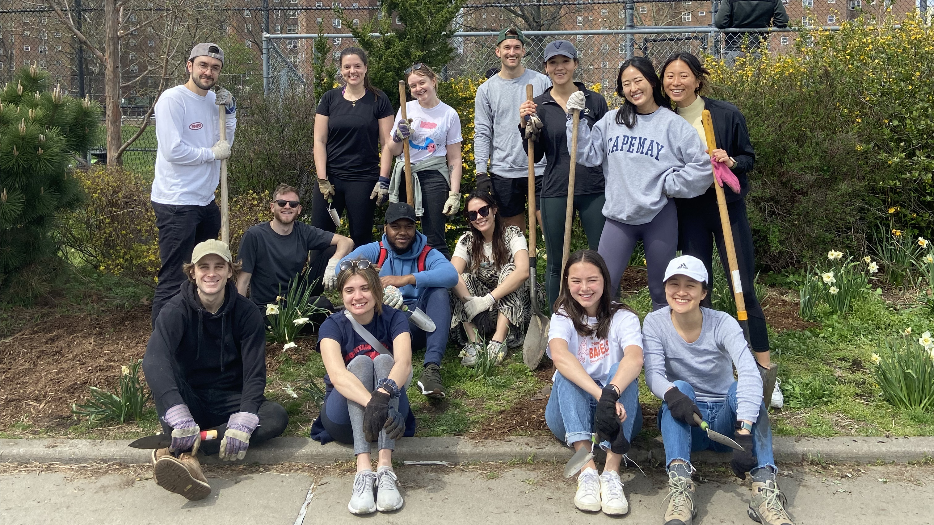 Group photo of Yext team members volunteering at a roadside cleanup event.