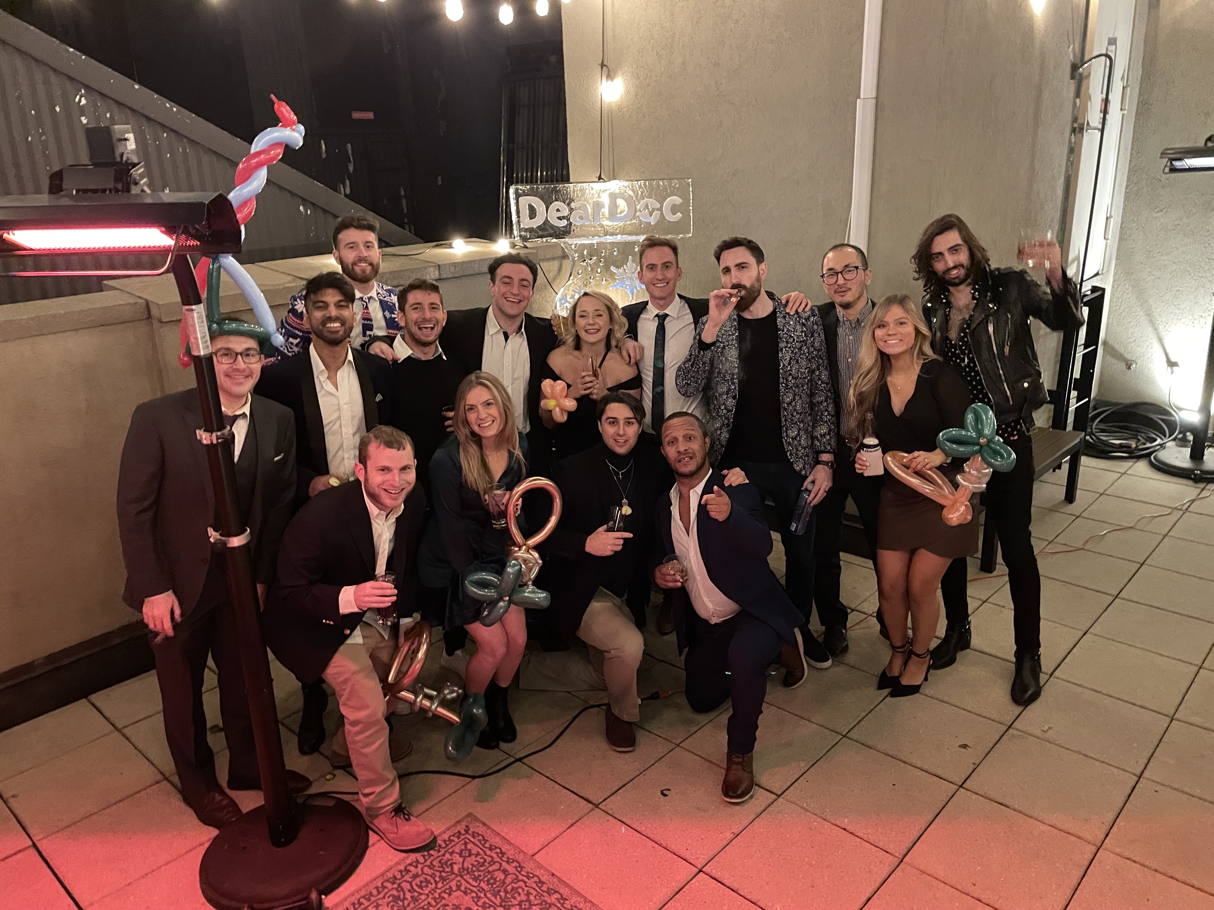 A group of DearDoc employees at a party.