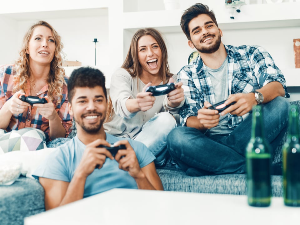 A group of friends playing video games