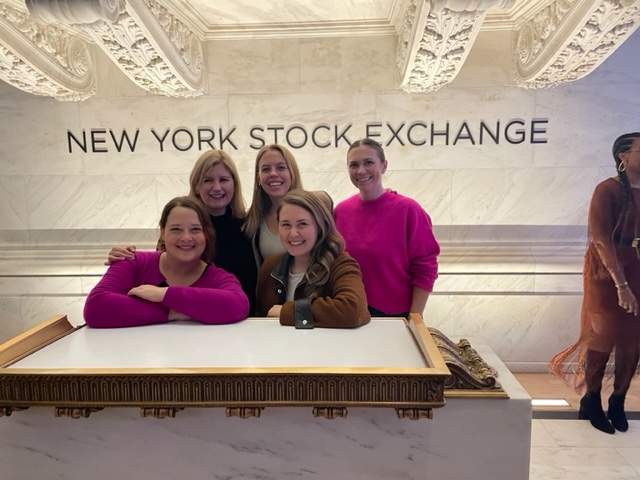 A group of employees at the New York Stock Exchange.