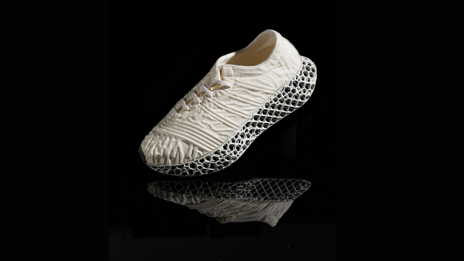 3-D printed black and white, low-top shoe