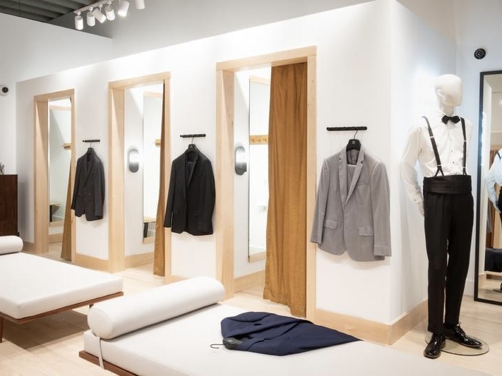 Dressing room area of suit store. 