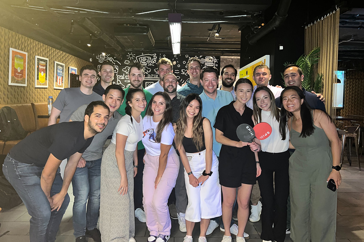 Torch Technology group photo at a ping pong event