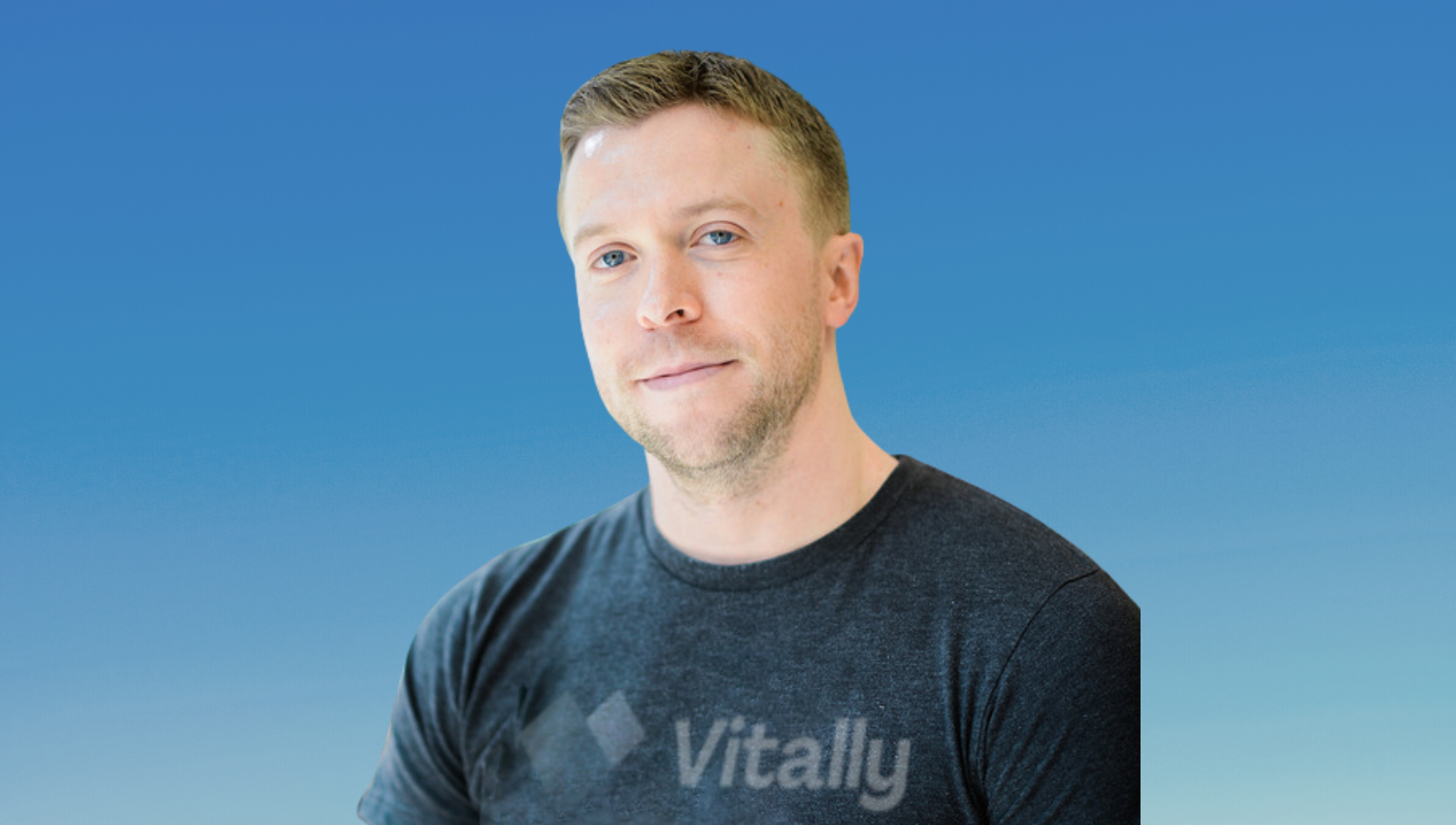 Vitally founder and CEO Jamie Davidson is pictured against a blue background.