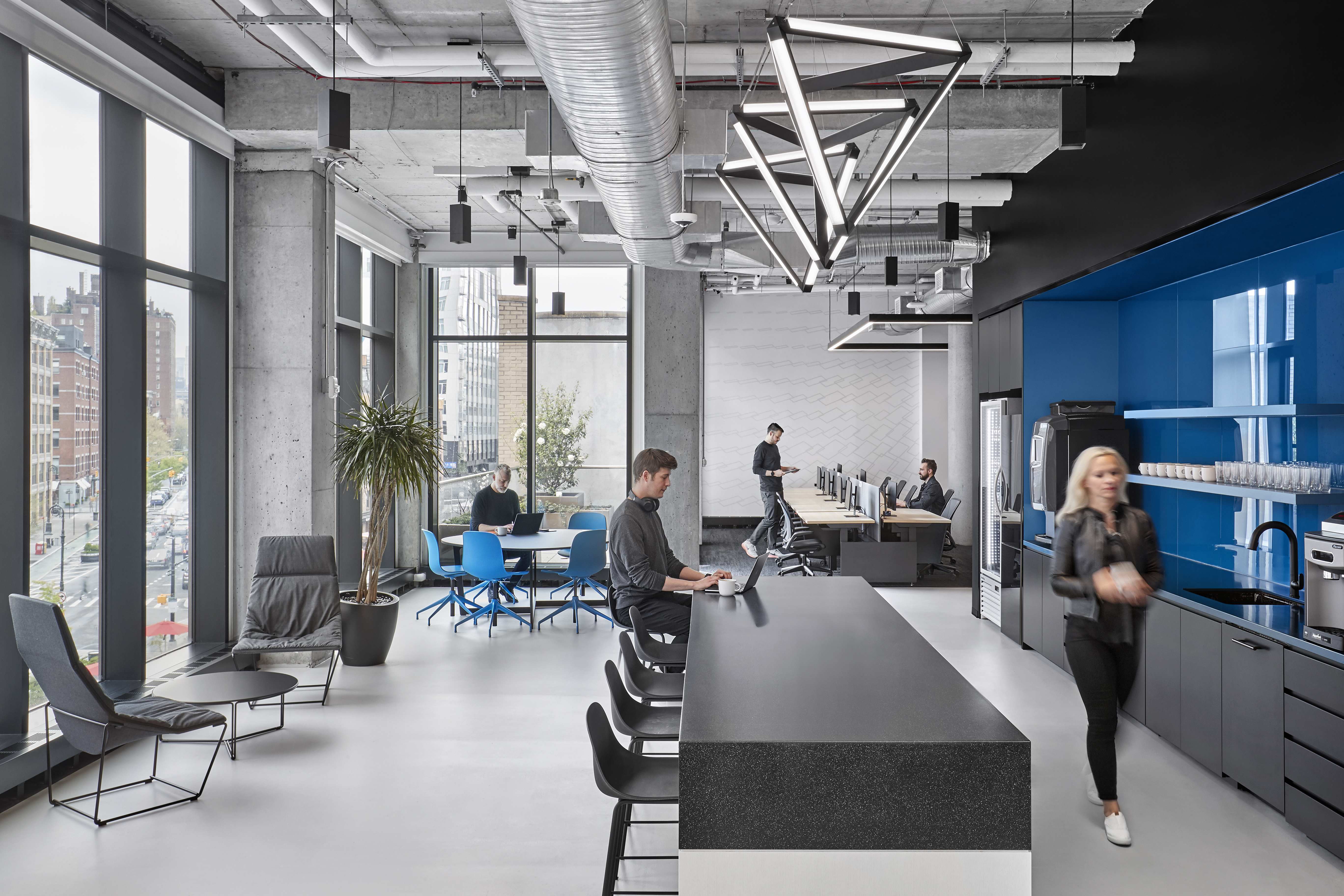 Team members in a common area of Yext's HQ
