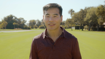 Sparrow Golf CEO Joe Chin is pictured on a golf course.S
