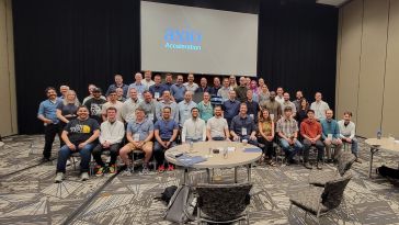 Large group photo of Axio team members 