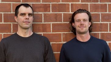 UserHub's co-founders are pictured in a photo together.